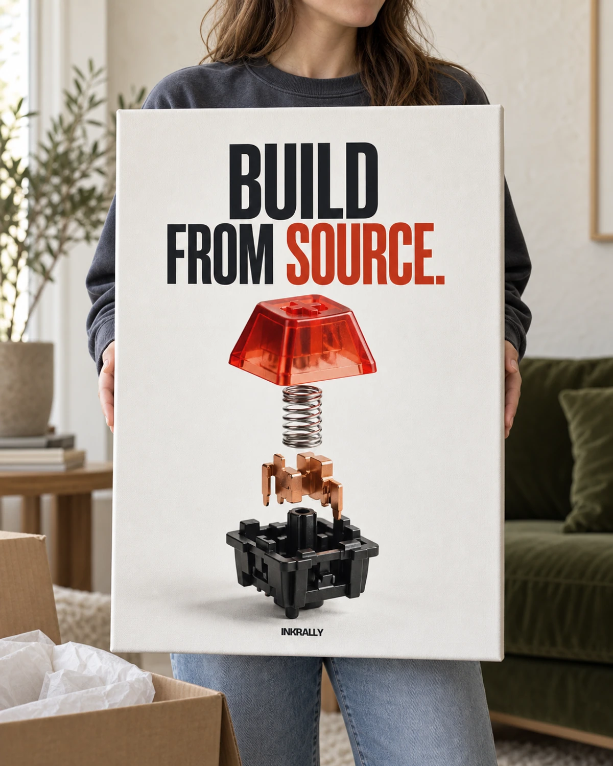 Build From Source stretched canvas held after unpacking in a naturally lit home