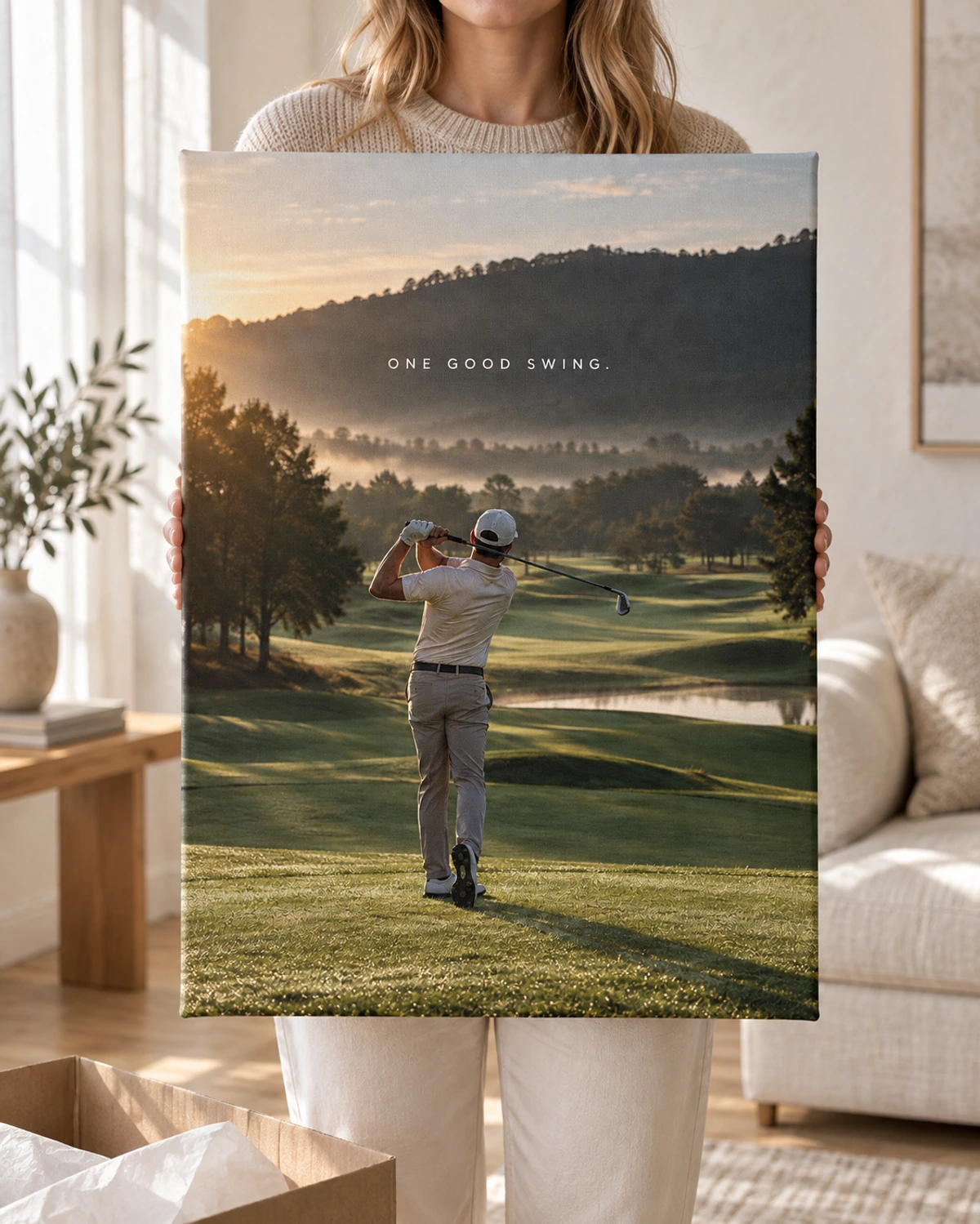 One Good Swing stretched canvas held after unpacking in a naturally lit home