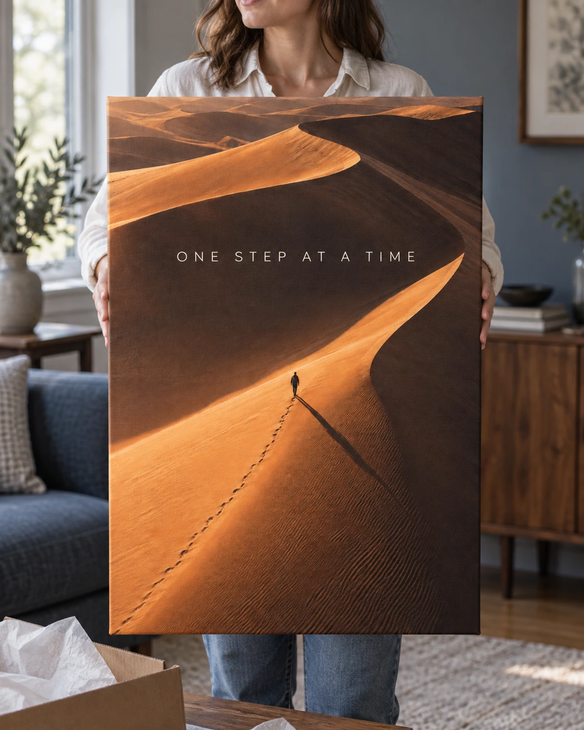 One step at a time. Canvas artwork held after unpacking